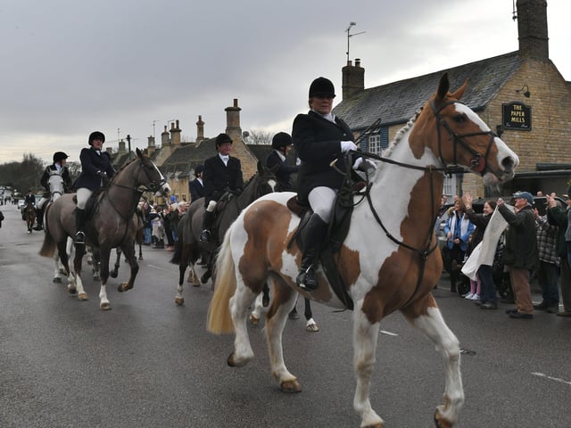 New Year's Day Fitzwilliam Hunt pass through Wansford Village.