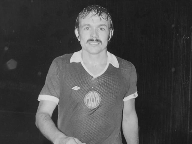 Centre forward John Cozens didn't enter the Football League until the age of 24 and, after a promising start at Notts County, he was out of favour there when new Posh manager Noel Cantwell made him his first signing in December, 1972. His new club were struggling at the foot of the Fourth Division table at the time, but a brilliant manager and the goals of Cozens led Posh to the title the following season. Cozens captained that side. At £8k he turned out be a brilliant bargain.