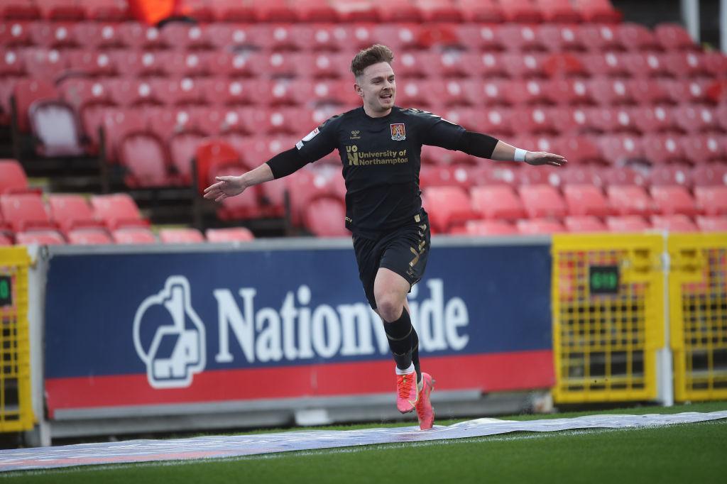 Sam Hoskins celebrates his first-half equaliser.