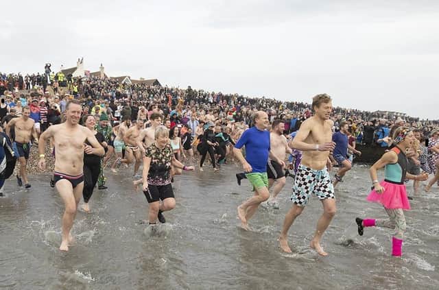 East Wittering New Year Big Dip 2022. Picture from Chris Hatton SUS-220201-110841001