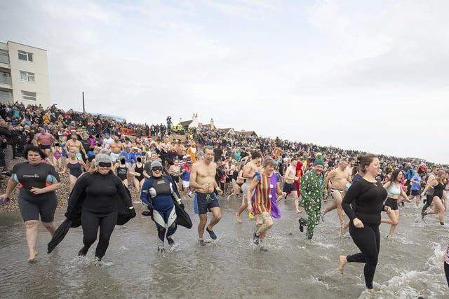 East Wittering New Year Big Dip 2022. Picture from Chris Hatton SUS-220201-110830001