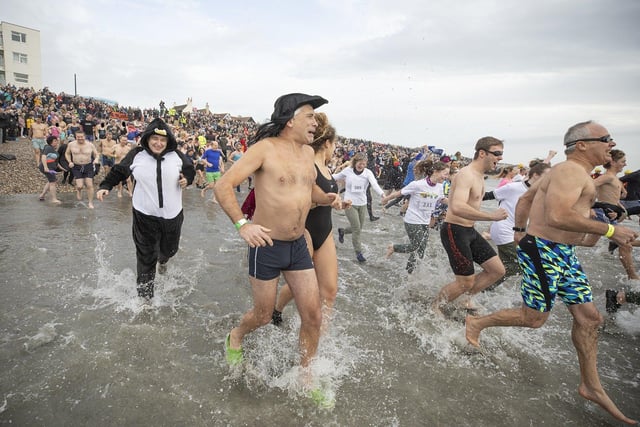 East Wittering New Year Big Dip 2022. Picture from Chris Hatton SUS-220201-110806001