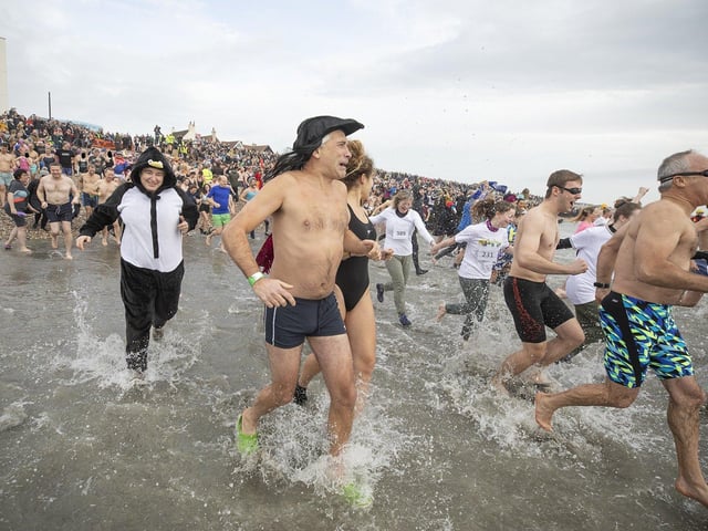 East Wittering New Year Big Dip 2022. Picture from Chris Hatton SUS-220201-110806001