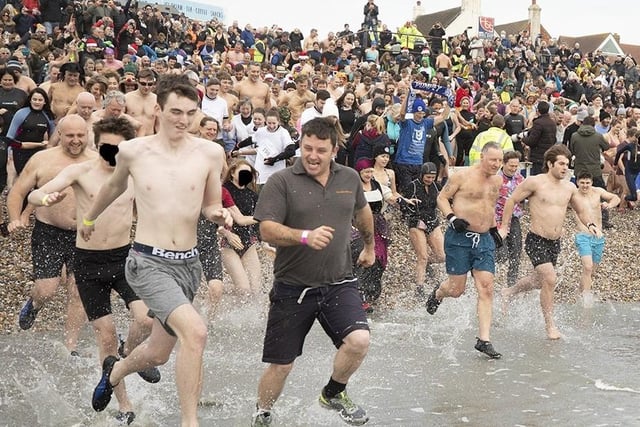 East Wittering New Year Big Dip 2022. Picture from Chris Hatton SUS-220201-111726001