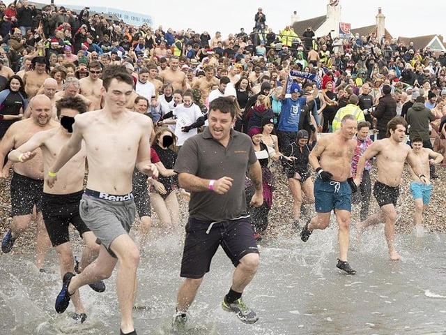East Wittering New Year Big Dip 2022. Picture from Chris Hatton SUS-220201-111726001