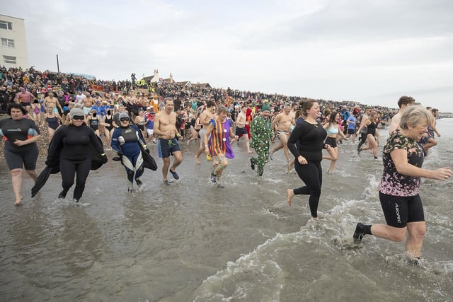 East Wittering New Year Big Dip 2022. Picture from Chris Hatton SUS-220201-110818001