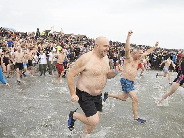 East Wittering New Year Big Dip 2022. Picture from Chris Hatton SUS-220201-112029001