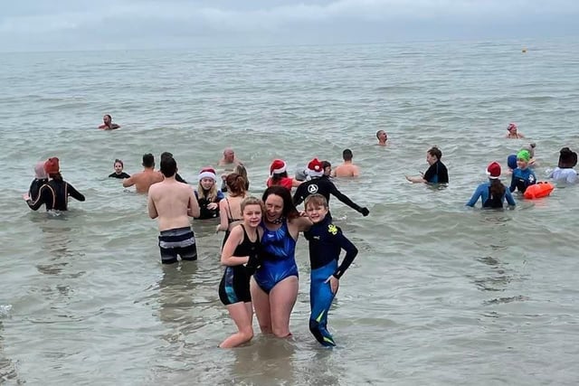 Fish 2 Water, an Eastbourne swimming club that focuses on sea water swimming, hosted the Boxing Day swim to raise money for the RNLI. SUS-220401-093432001