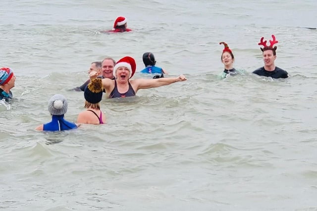 Fish 2 Water, an Eastbourne swimming club that focuses on sea water swimming, hosted the Boxing Day swim to raise money for the RNLI. SUS-220401-093522001