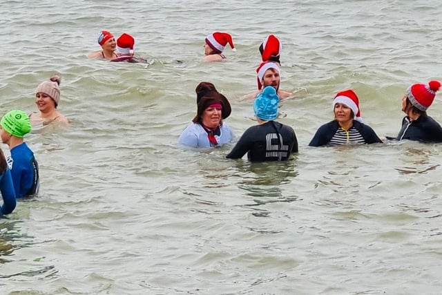 Fish 2 Water, an Eastbourne swimming club that focuses on sea water swimming, hosted the Boxing Day swim to raise money for the RNLI. SUS-220401-093602001