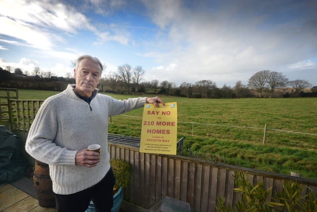 Residents opposed to a planning application to build 210 homes in fields off Fryatts Way in Bexhill.

Tony Chamberlain pictured in his back garden with a section of the land in the background. SUS-220401-121526001
