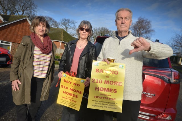 Residents opposed to a planning application to build 210 homes in fields off Fryatts Way in Bexhill. SUS-220401-121552001
