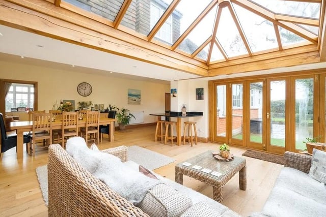 The kitchen, dining room and timber-framed orangery offers a large and versatile space ideal for day-to-day family life. Picture: Savills - Haywards Heath.