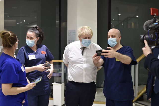 Prime Minister Boris Johnson visiting the vaccination centre at Queensgate. EMN-220601-185555009
