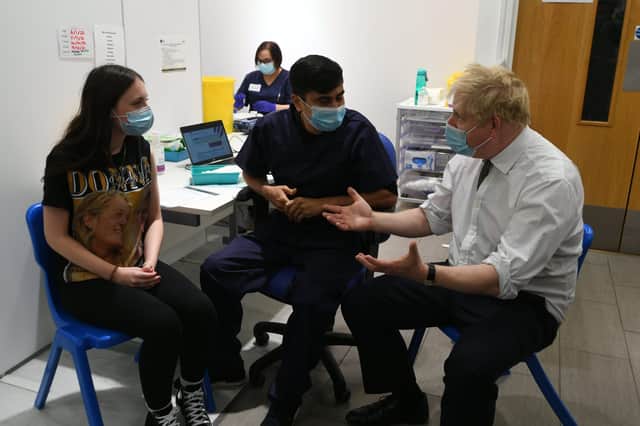 Prime Minister Boris Johnson visiting the vaccination centre at Queensgate. EMN-220601-185108009