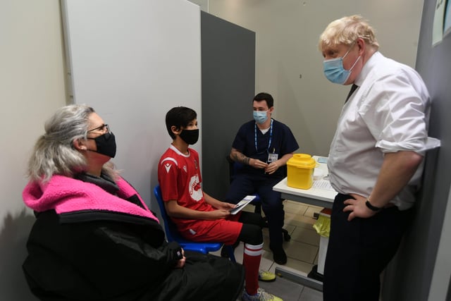 Prime Minister Boris Johnson visiting the vaccination centre at Queensgate. EMN-220601-185310009