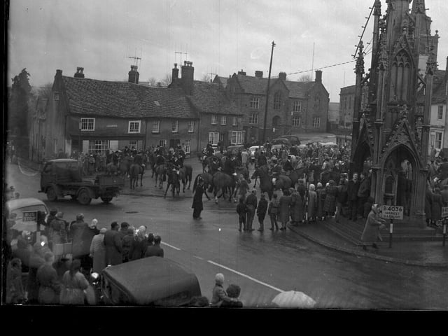 Saddled up for Pytchley Hunt in Daventry town centre in December, 1960.