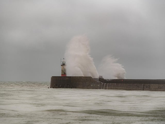 Waves slam against the harbour wall at Newhaven as heavy rain and 40 mile an hour winds batter the south coast of Britain