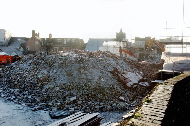The former swimming pool is reduced to a heap of rubble