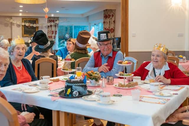 Mad Hatter's tea party at Bernhard Baron Cottage Homes in Polegate SUS-221101-140908001