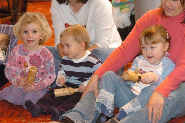 Tiny tots sing-a-long at the Key Theatre, pictured  are  Alice Callcutt  [3], Sam Callcutt [2] and Isabel Keogh [3] in 2004.