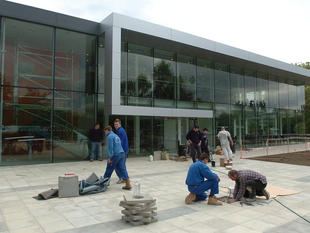 The opening day at the Key Theatre - with workmen still putting final touches to site