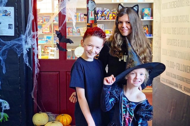 Keeping it in the family....Michelle's children dress up for a Halloween event at the shop.