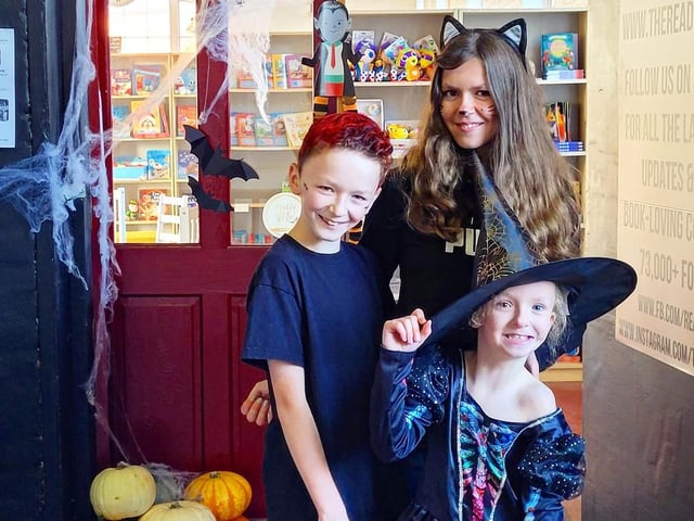 Keeping it in the family....Michelle's children dress up for a Halloween event at the shop.