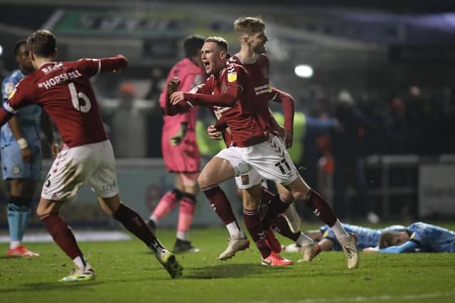 Mitch Pinnock's thunderous equaliser sparked scenes of mayhem all around Sixfields. Pictures: Pete Norton.