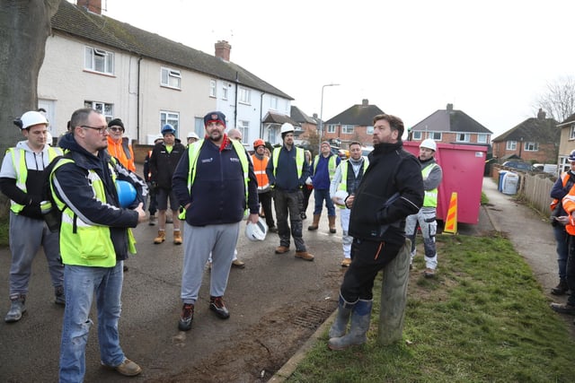 Nick Knowles chats to volunteers in the street as the Big Build begins