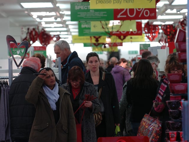 Shoppers at Marks & Spencer's Bridge Street during 20% off sale.