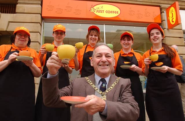 Mayor, Cliff Sneesby, with staff from Just Coffee  Diane Gater, Simon Thompson, Carly Hawes, Melanie Farr and Carol Gater-Condon at the official opening of Not Just Coffee shop in Bridge Street.