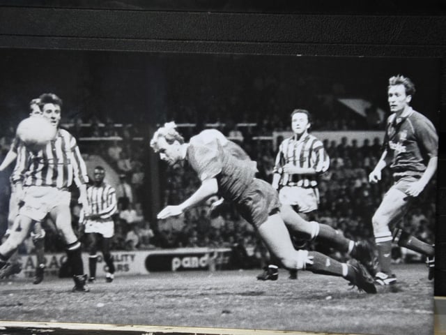 Cooper's loan spell from Tranmere looked like ending in disappointment towards the end of the 1991-1992 season, but five minutes from the end of a pulsating Third Division play-off semi-final second leg at Huddersfield Town Cooper launched himself through to air to meet a Bobby Barnes cross to claim the winning goal that sent Posh to Wembley for the first time and ultimately to the second tier of English football, also for the first time. It was the only Posh goal he scored, but one that cemented him in club folklore.