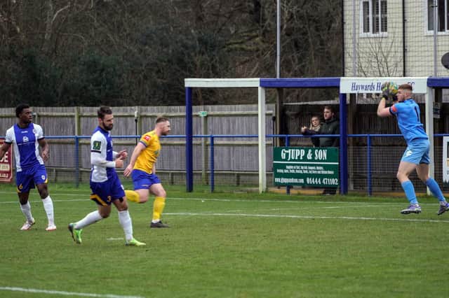 Action from Lancing's goalless draw at Haywards Heath Town / Pictures: Ray Turner