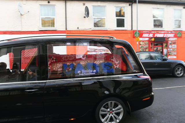 The hearse passing his former shop on Cromwell Road.