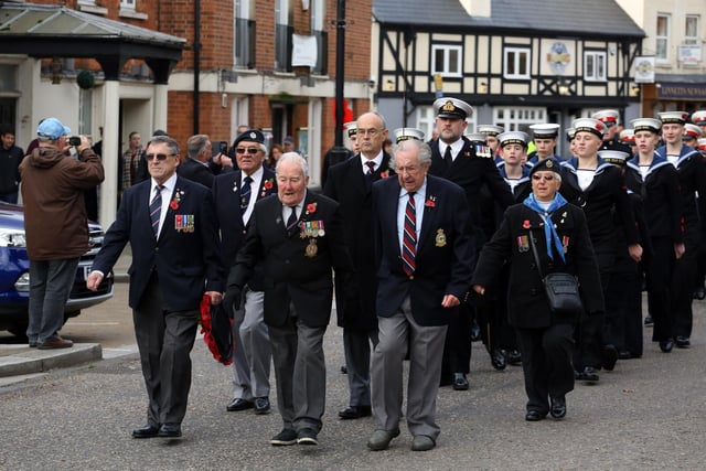 Barry Oram (marching on the left) next to Reg (centre) on Remembrance Day 2019
