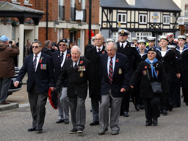 Barry Oram (marching on the left) next to Reg (centre) on Remembrance Day 2019