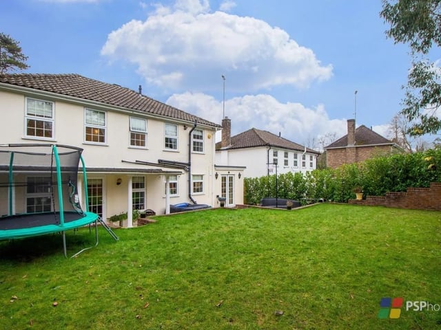 There is an expanse of lawn in the rear garden that is ideal for children to play on. Picture: PSP Homes.