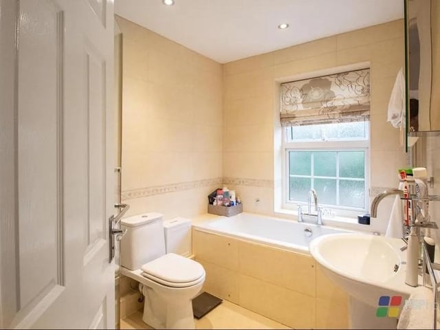 The master bedroom has its own contemporary ensuite with Jacuzzi bath and separate shower. Picture: PSP Homes.