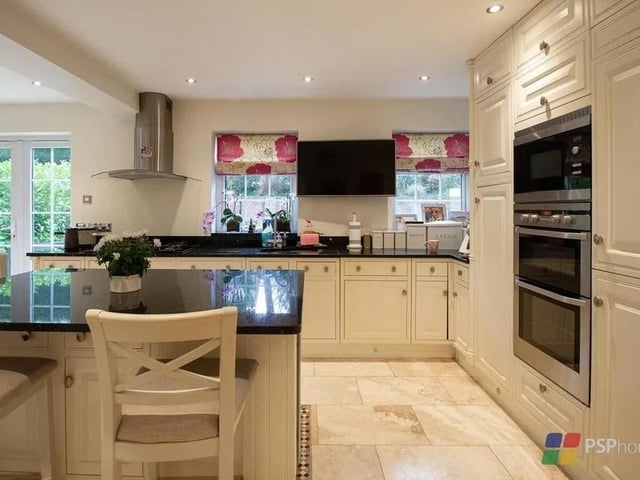 The kitchen/diner extends to 21ft and has a central island with a breakfast bar. Picture: PSP Homes.
