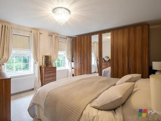 The master bedroom has its own contemporary ensuite with Jacuzzi bath and separate shower. Picture: PSP Homes.