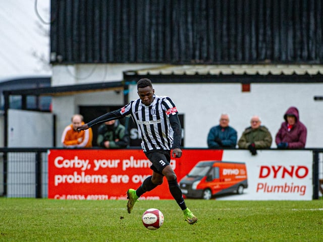 All eyes on the ball for Corby left-back Kamy Apindia