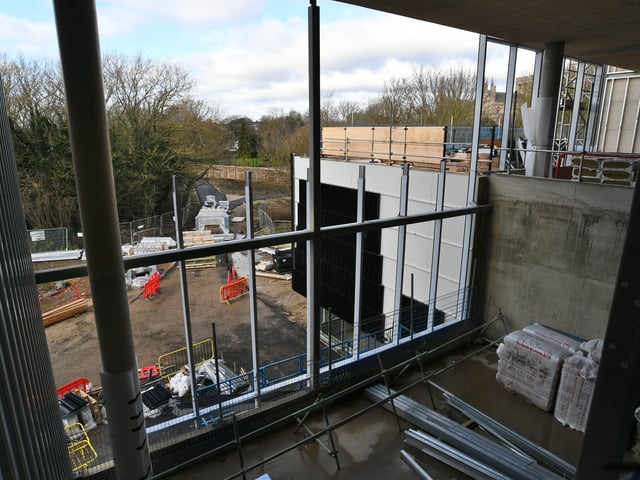 Loooking to the rear of the new university - with the open air terreace to the right. EMN-220214-144757009