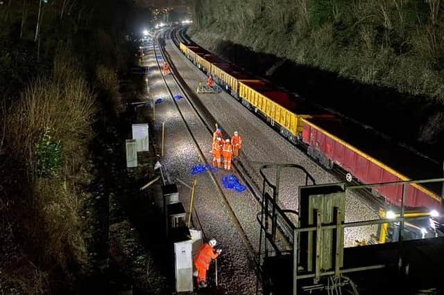 Work began on the Brighton Main Line on Friday night (February 18) in spite of Storm Eunice. Picture: Network Rail Kent & Sussex.