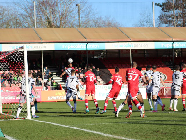 Jordan Tunnicliffe climbs highest to head home. Crawley Town v Forest Green Rovers. Picture by Cory Pickford SUS-220226-174535004
