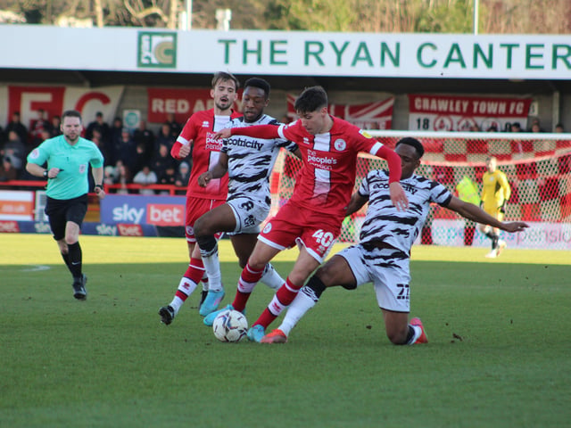 Isaac Hutchinson. Crawley Town v Forest Green Rovers. Picture by Cory Pickford SUS-220226-174651004