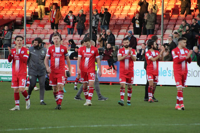 The Players at the end of the game. Crawley Town v Forest Green Rovers. Picture by Cory Pickford SUS-220226-191354004