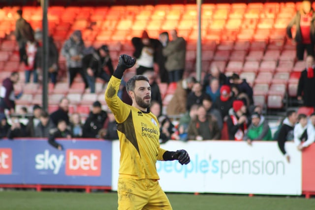 Glenn Morris celebrates at the final whistle. Crawley Town v Forest Green Rovers. Picture by Cory Pickford SUS-220226-191413004