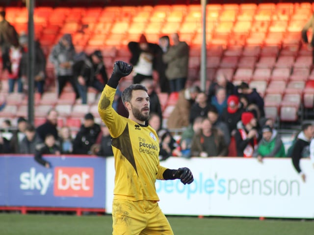 Glenn Morris celebrates at the final whistle. Crawley Town v Forest Green Rovers. Picture by Cory Pickford SUS-220226-191413004