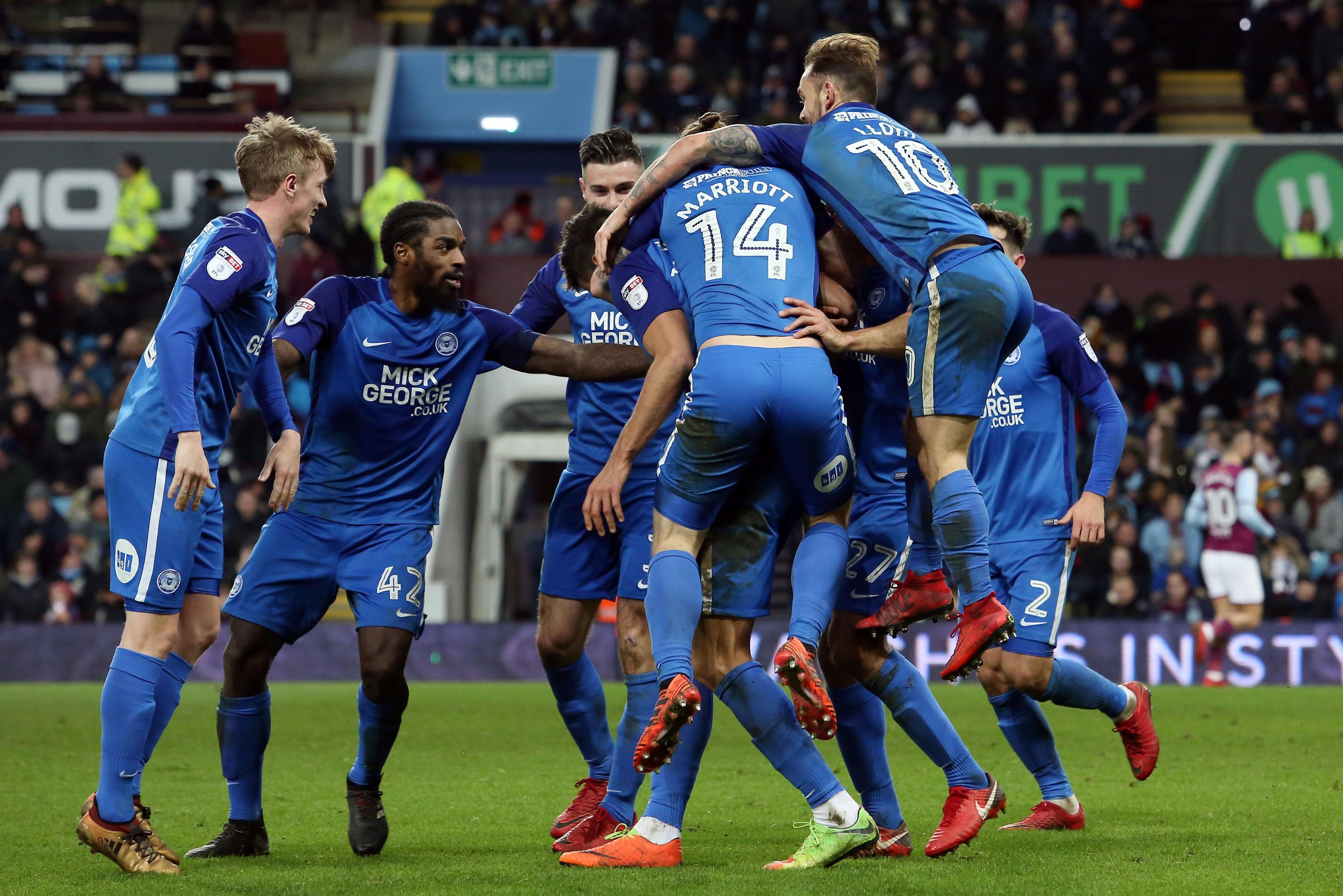Posh celebrate a goal in their 3-1 win at Aston Villa in a 2018 FA Cup tie. Photo: Joe Dent/theposh.com.